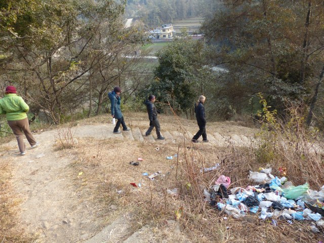 Acupuncture Relief Team walking down a local village trail