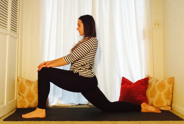 Instructor Courtney Morgan of Revolver Yoga Studio demonstrates a simple lunge yoga pose from her yin yoga class